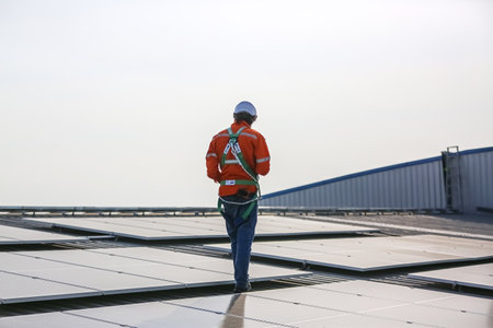 professional technician or engineer installing solar panels, Alternative energy for installed solar...