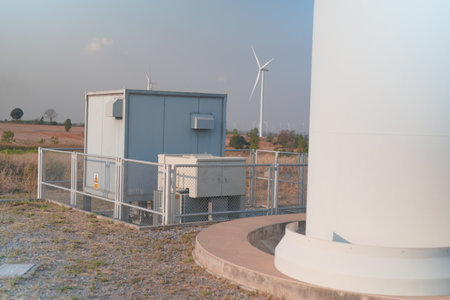 Engineer working at alternative renewable wind energy farm - Sustainable energy industry conceptの写真素材