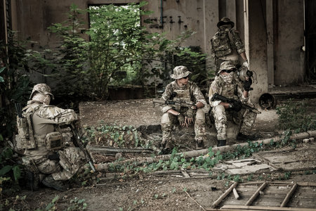 United States Army ranger during the military operation. Professional marine soldiers training with...