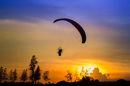 Paramotor Flying Silhouetteの写真素材