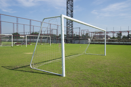Soccer goal with net. Football goal on the field.