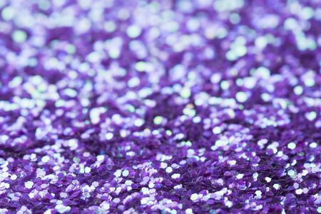 Violet giltter bokeh abstract backgroundの写真素材