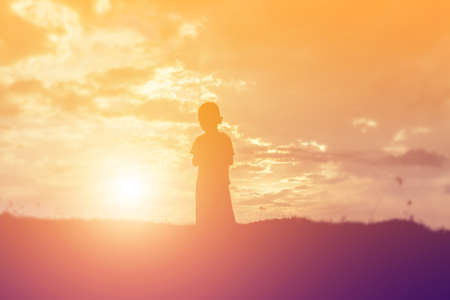 kid silhouette,Moments of the child's joy. On the Nature sunset