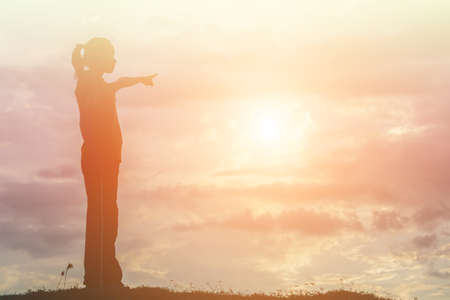 Sad and depressed woman sitting aloneの写真素材