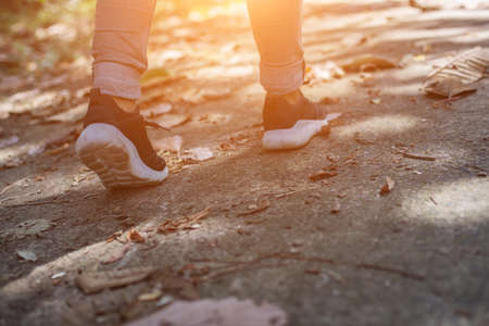 Women Sports Shoes and Meadowsの写真素材