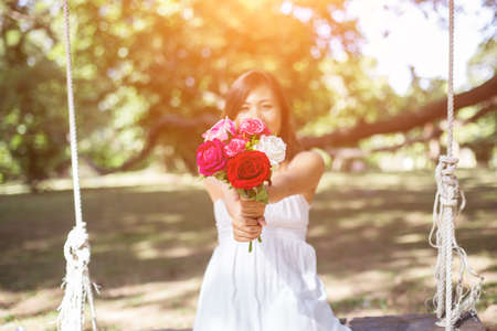 Flowers in woman handの写真素材