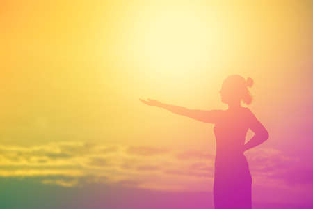Young woman raise hands up for her success, Concept of Success in life.