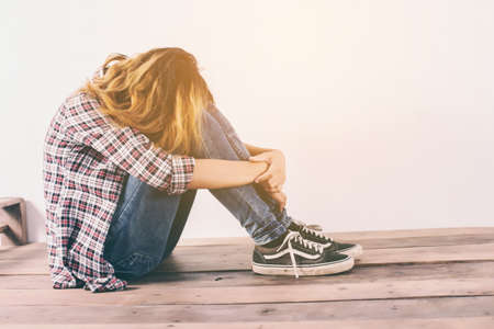 Sad woman hug her knee,nobody の写真素材