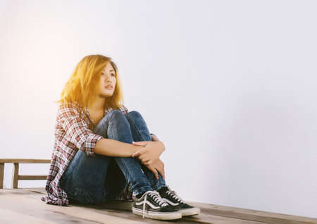 Sad woman hug her knee,nobody の写真素材