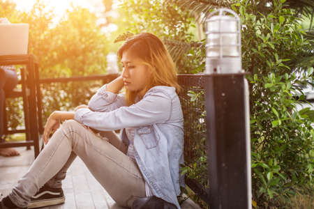 Sad woman hug her knee,nobodyの写真素材