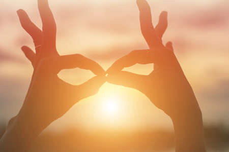 hands-shape for the Sun.の写真素材
