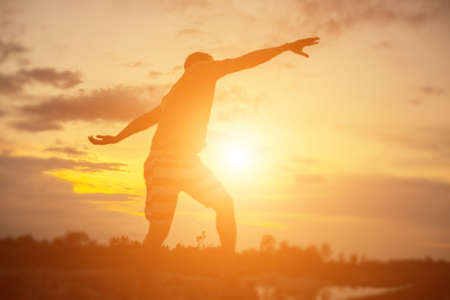 Man in the sunsetの写真素材