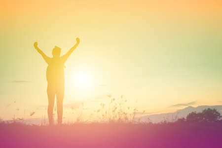 woman travelling in nature with backpackの写真素材