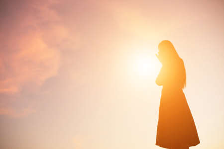 Sad and depressed woman aloneの写真素材