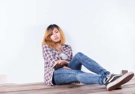 Sad woman hug her knee,nobodyの写真素材