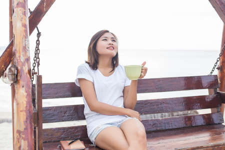 Enjoying the coffee aromaの写真素材