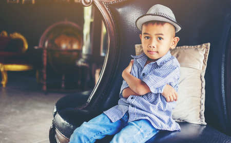 Boy deep in thoughtの写真素材
