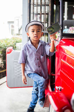 Boy deep in thoughtの写真素材