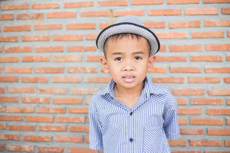 Boy deep in thoughtの写真素材