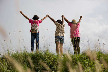 silhouette of a happy children and happy time sunsetの写真素材