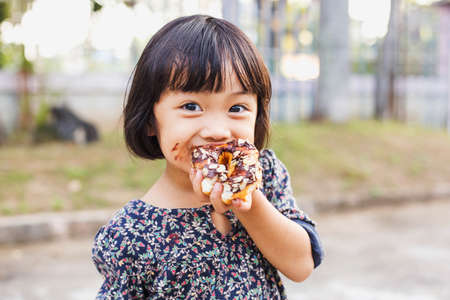 Little baby eat cake の写真素材