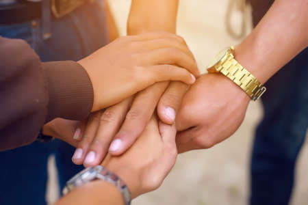 Stack of hands. Unity and teamwork concept.