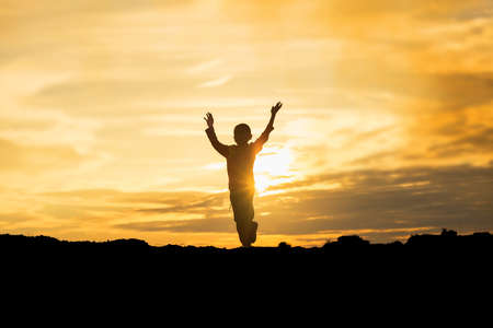 kid silhouette,Moments of the child's joy. On the Nature sunset