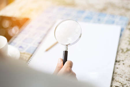 magnifying glass for reading and discovering the small thingsの写真素材