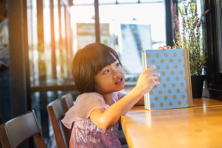 Child education. Girl reading book.の写真素材