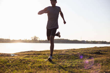 The man with runner on the street be running for exercise.の写真素材