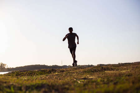 The man with runner on the street be running for exercise.の写真素材