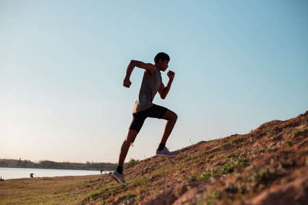 The man with runner on the street be running for exercise.の写真素材