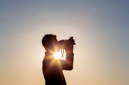 Photographer Silhouette take a view photoの写真素材