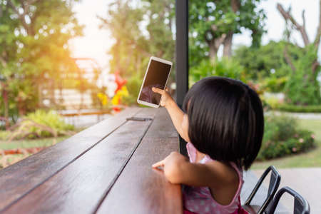 Asian Child Happy Use Talephone In communicate