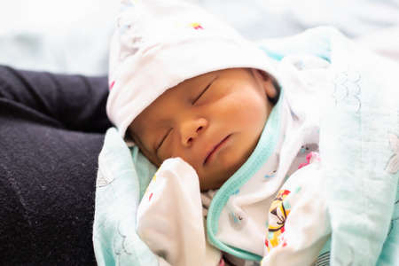 Cute asian baby newborn close upの写真素材