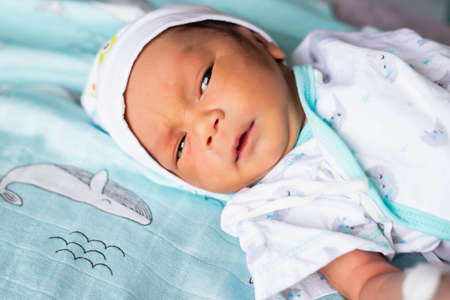 Cute asian baby newborn close upの写真素材