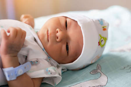 Cute asian baby newborn close upの写真素材
