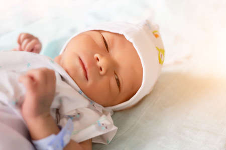 Cute asian baby newborn close upの写真素材