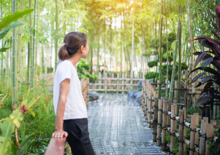 Hand of Young Woman Enjoying Nature with sunrise.の写真素材