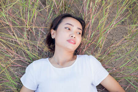 Hand of Young Woman Enjoying Nature with sunrise.の写真素材