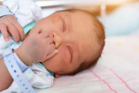 Cute asian baby newborn close upの写真素材