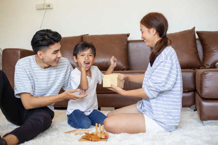 happy family playing at home,Mom and baby are happiness coexistence,happy family concept and Creating activities to strengthen skills for children.の写真素材