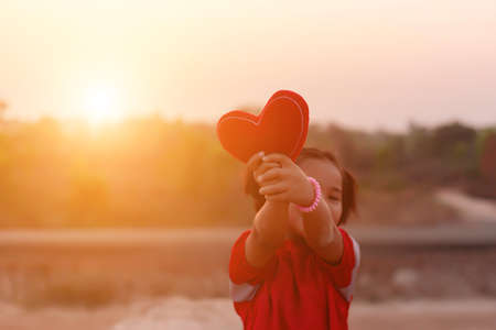 kid silhouette,Moments of the child's joy. On the Nature sunsetの写真素材