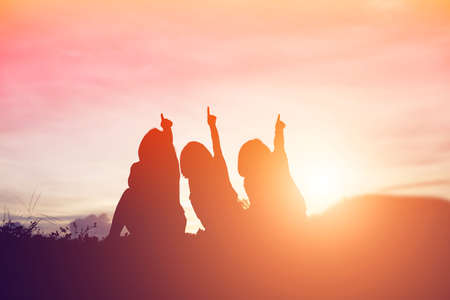 silhouette of a happy children and happy time sunsetの写真素材