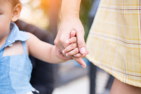 Mother's and a child hands