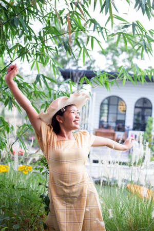 Beauty young woman with flowers and make up close , real spring girlの写真素材
