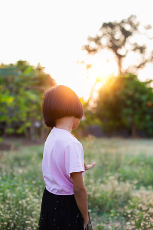 Cute little girl on the meadowの写真素材
