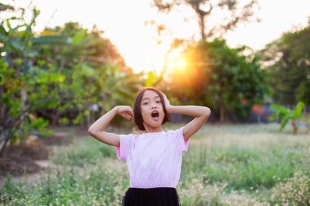 Cute little girl on the meadowの写真素材