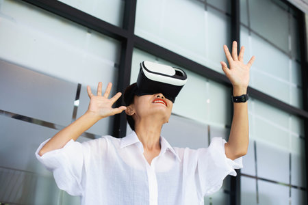 Young girl play virtual reality game hold vr glasses and surprised. Cyber space and virtual gaming