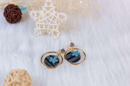 These earrings are handmade by ourselves. Earrings made of raw materials purchased online. Round...
